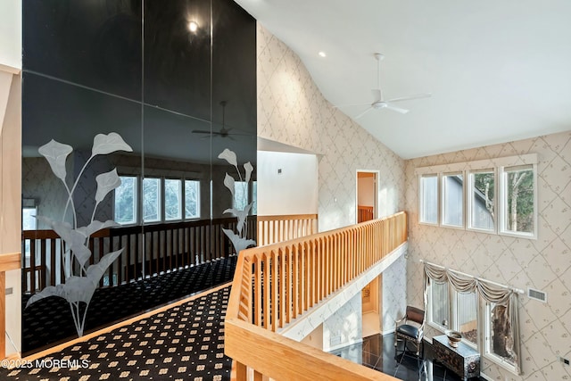 7 Jayhawk Way, Holmdel, NJ 07733 - staircase featuring wallpapered walls, a ceiling fan, vaulted ceiling, and healthy amount of natural light