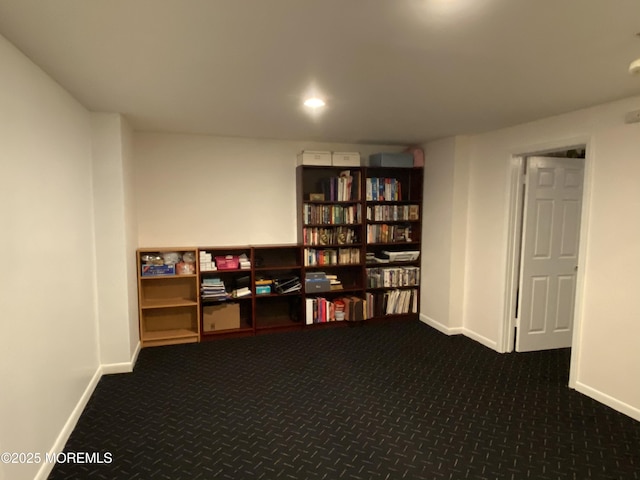 7 Erte Pl, Marlboro, NJ 07746 - home office with dark colored carpet and baseboards