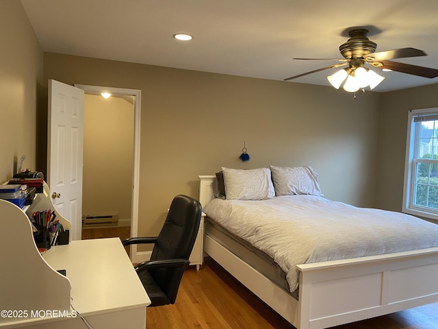 7 Erte Pl, Marlboro, NJ 07746 - bedroom featuring a baseboard radiator, wood finished floors, recessed lighting, an office area, and a ceiling fan