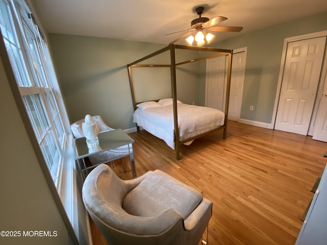 7 Erte Pl, Marlboro, NJ 07746 - bedroom featuring wood finished floors, multiple closets, and ceiling fan