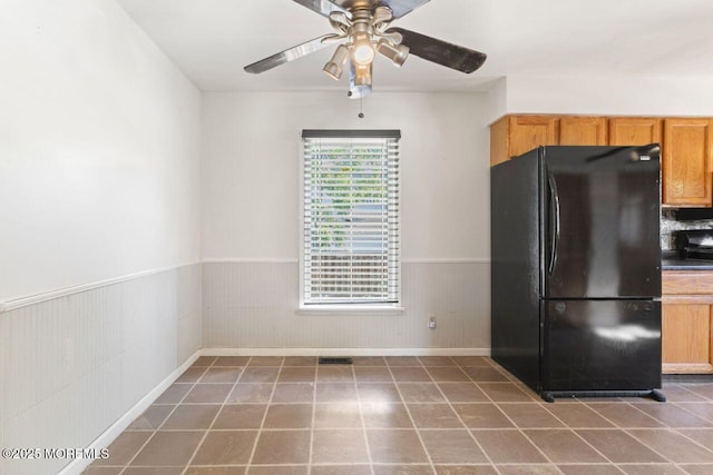 45 Letts Landing Rd, Waretown, NJ 08758 - kitchen featuring freestanding refrigerator, wainscoting, a ceiling fan, and tile patterned floors