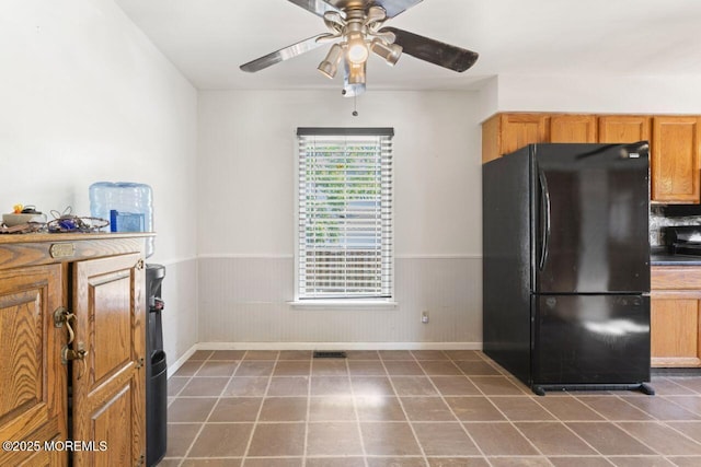 45 Letts Landing Rd, Waretown, NJ 08758 - kitchen featuring freestanding refrigerator, a wainscoted wall, ceiling fan, and tile patterned floors