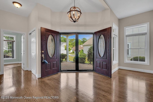 25 Merion Ln, Jackson, NJ 08527 - foyer featuring a chandelier, wood finished floors, and plenty of natural light