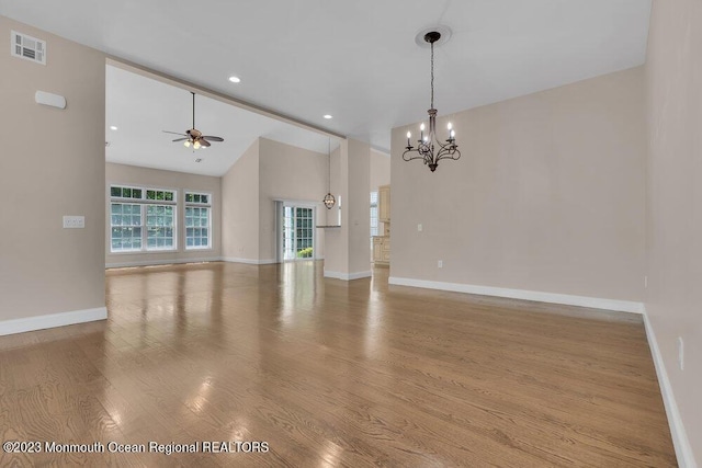 25 Merion Ln, Jackson, NJ 08527 - empty room with a chandelier, wood finished floors, a ceiling fan, high vaulted ceiling, and recessed lighting