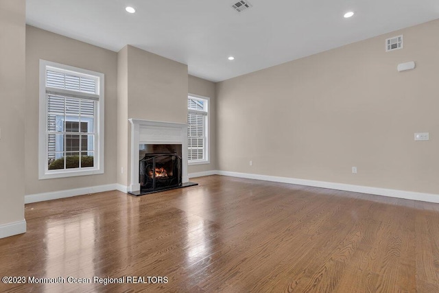 25 Merion Ln, Jackson, NJ 08527 - unfurnished living room featuring wood finished floors, a fireplace, and recessed lighting