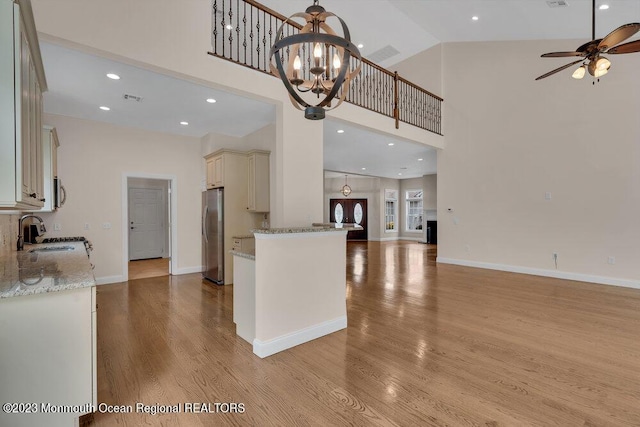 25 Merion Ln, Jackson, NJ 08527 - kitchen featuring open floor plan, cream cabinetry, freestanding refrigerator, light wood-style floors, and ceiling fan