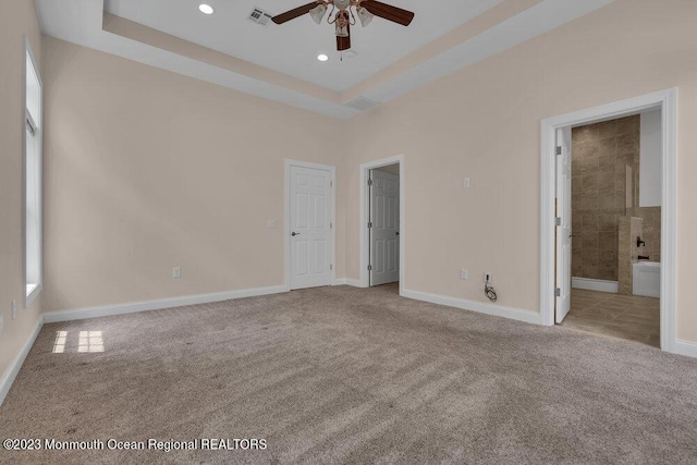 25 Merion Ln, Jackson, NJ 08527 - unfurnished bedroom featuring carpet flooring, recessed lighting, a raised ceiling, connected bathroom, and ceiling fan