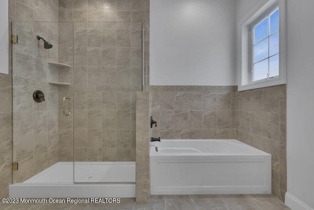25 Merion Ln, Jackson, NJ 08527 - bathroom with a bath, a shower stall, and tile walls
