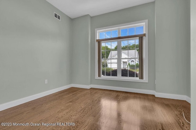 25 Merion Ln, Jackson, NJ 08527 - spare room with plenty of natural light and wood finished floors