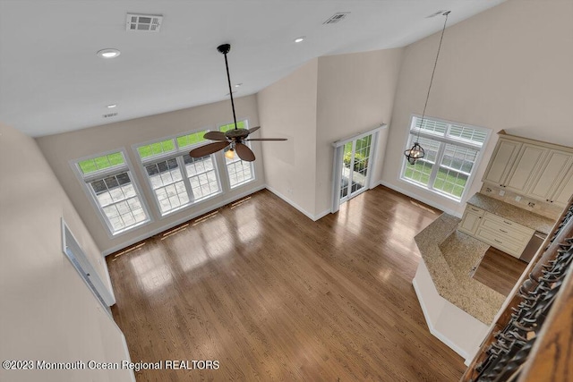 25 Merion Ln, Jackson, NJ 08527 - unfurnished living room with high vaulted ceiling, a ceiling fan, wood finished floors, and recessed lighting