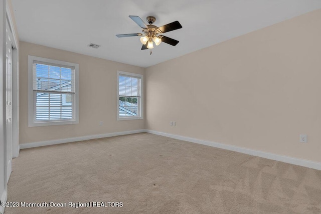 25 Merion Ln, Jackson, NJ 08527 - spare room with a ceiling fan and light colored carpet