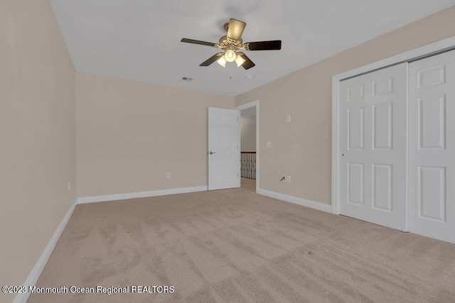 25 Merion Ln, Jackson, NJ 08527 - unfurnished bedroom with light colored carpet, a closet, and ceiling fan