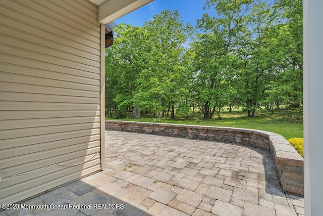 25 Merion Ln, Jackson, NJ 08527 - view of patio featuring view of wooded area