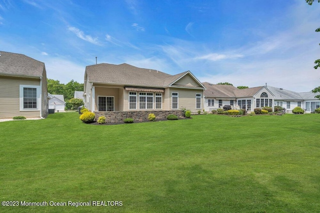 25 Merion Ln, Jackson, NJ 08527 - view of front of home with a front lawn and stone siding