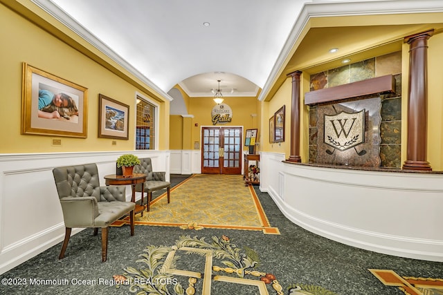 25 Merion Ln, Jackson, NJ 08527 - welcome area featuring decorative columns, a decorative wall, crown molding, vaulted ceiling, and arched walkways