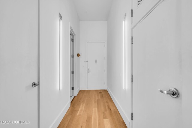 50 Dey St Unit 434, Jersey City, NJ 07306 - hallway with light wood-style flooring and baseboards