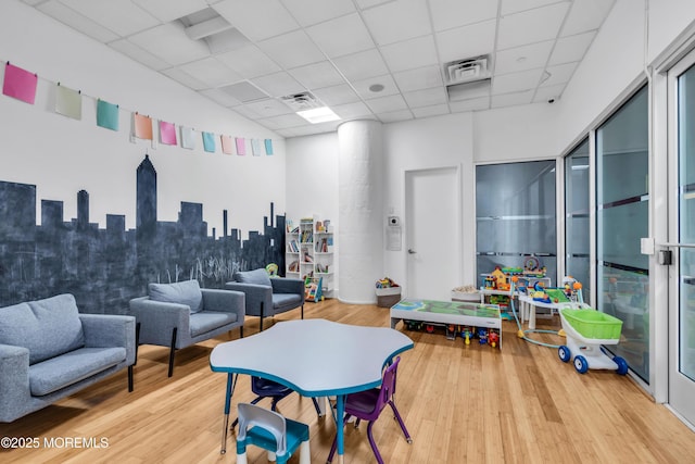 50 Dey St Unit 434, Jersey City, NJ 07306 - playroom with a paneled ceiling and wood finished floors