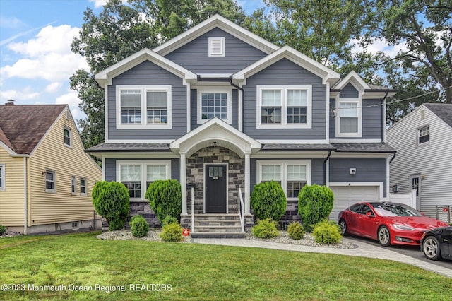 767 Hemlock Rd, Union, NJ 07083 - craftsman inspired home with stone siding, a front lawn, and an attached garage