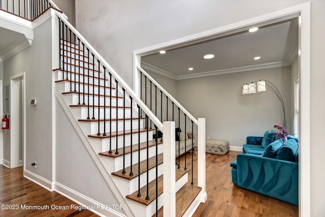 767 Hemlock Rd, Union, NJ 07083 - staircase with ornamental molding, wood finished floors, and recessed lighting