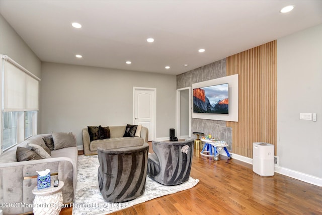 767 Hemlock Rd, Union, NJ 07083 - living room featuring wood finished floors, recessed lighting, and an accent wall