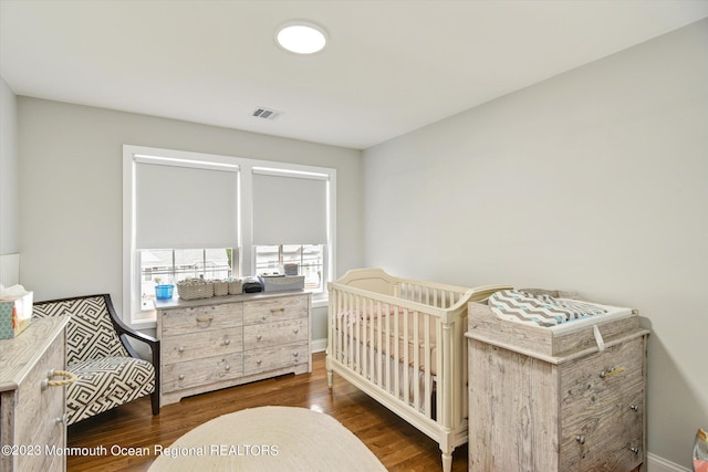 767 Hemlock Rd, Union, NJ 07083 - bedroom featuring wood finished floors and baseboards