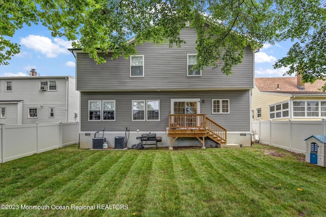 767 Hemlock Rd, Union, NJ 07083 - rear view of house with a fenced backyard