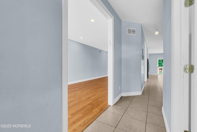 25 Rockefeller Dr, Lakewood, NJ 08701 - corridor featuring light tile patterned floors and recessed lighting