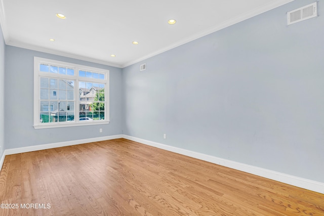 25 Rockefeller Dr, Lakewood, NJ 08701 - unfurnished room with crown molding, wood finished floors, and recessed lighting
