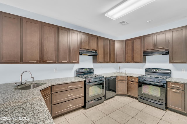 25 Rockefeller Dr, Lakewood, NJ 08701 - kitchen with black appliances, light tile patterned floors, under cabinet range hood, and light stone counters