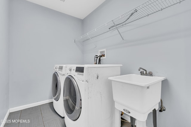 25 Rockefeller Dr, Lakewood, NJ 08701 - laundry area with baseboards and washer and dryer