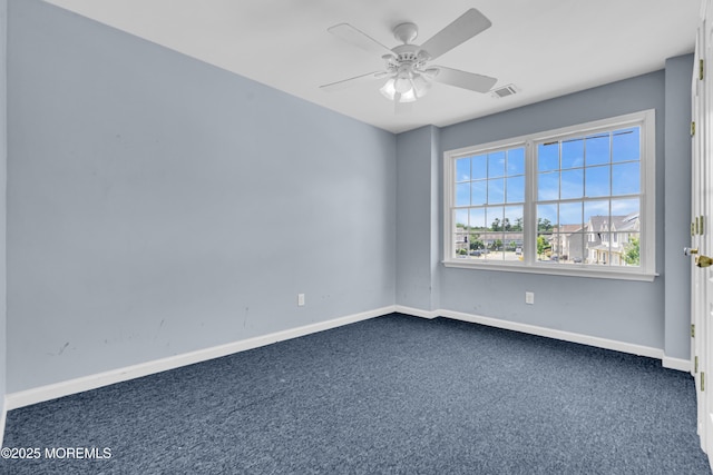 25 Rockefeller Dr, Lakewood, NJ 08701 - spare room with dark colored carpet and a ceiling fan