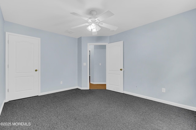25 Rockefeller Dr, Lakewood, NJ 08701 - spare room featuring dark carpet and ceiling fan