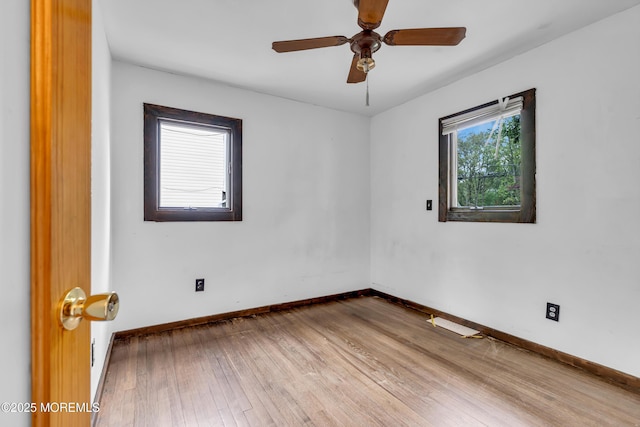 215 Sunset Ln, Howell, NJ 07731 - spare room featuring wood finished floors and a ceiling fan