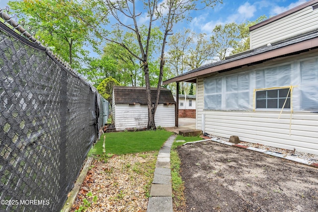 215 Sunset Ln, Howell, NJ 07731 - fenced backyard with a shed