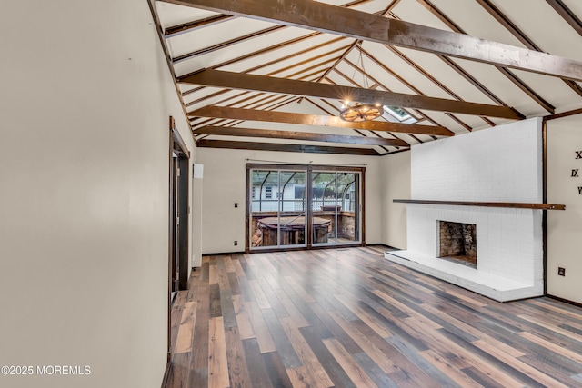215 Sunset Ln, Howell, NJ 07731 - unfurnished living room featuring a fireplace, wood finished floors, and a chandelier
