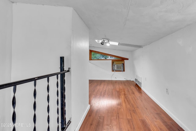 215 Sunset Ln, Howell, NJ 07731 - hallway with hardwood / wood-style flooring and cooling unit