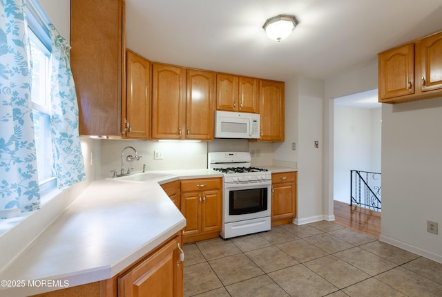 2152 Dover Pines Ave, Toms River, NJ 08755 - kitchen featuring white appliances, light countertops, and light tile patterned floors