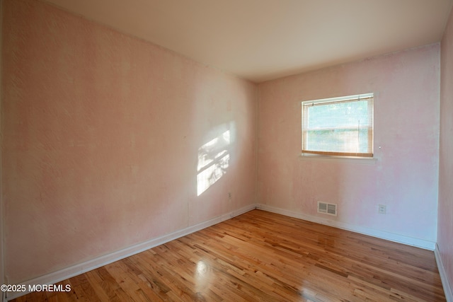 2152 Dover Pines Ave, Toms River, NJ 08755 - spare room with wood finished floors and baseboards