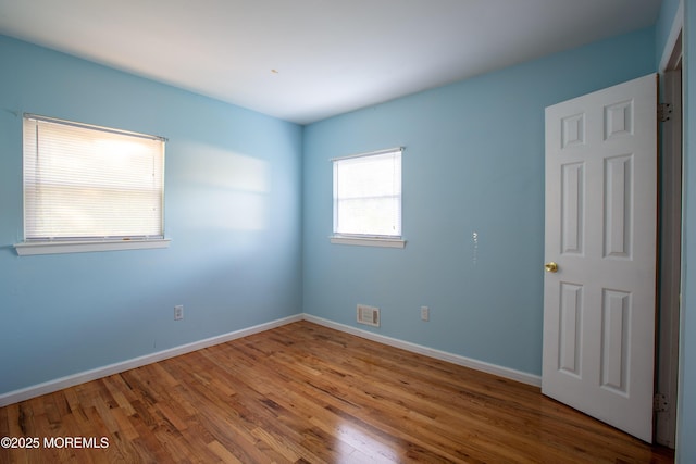 2152 Dover Pines Ave, Toms River, NJ 08755 - spare room with wood finished floors and baseboards