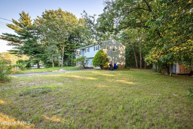 2152 Dover Pines Ave, Toms River, NJ 08755 - view of grassy yard with a garage and a storage shed