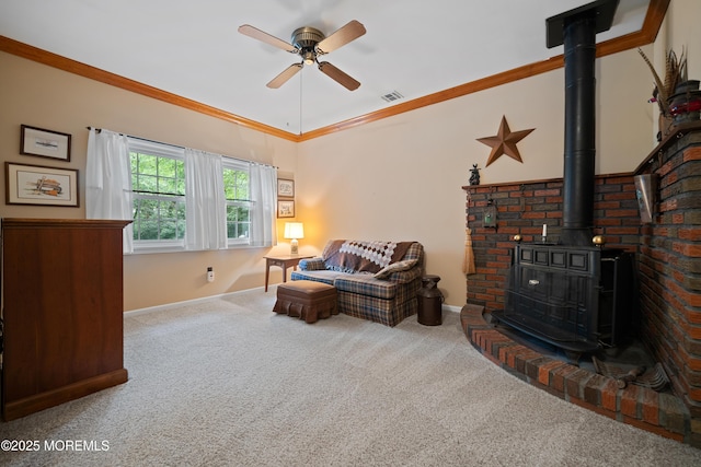 446 Steuben Ave, Forked River, NJ 08731 - carpeted living area with a wood stove and a ceiling fan