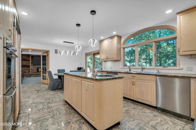 27 Darby Rd, East Brunswick, NJ 08816 - kitchen featuring stainless steel dishwasher, light brown cabinetry, dark stone counters, a center island, and recessed lighting