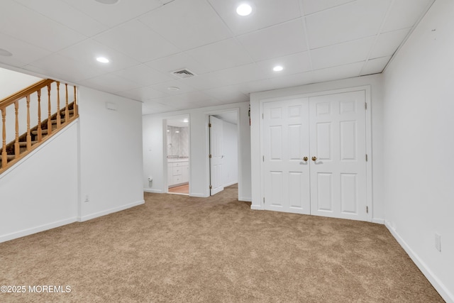 27 Darby Rd, East Brunswick, NJ 08816 - finished basement with carpet, stairway, recessed lighting, and a paneled ceiling