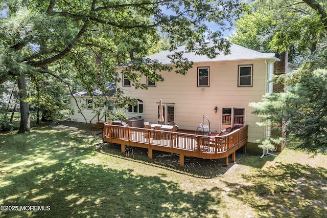 27 Darby Rd, East Brunswick, NJ 08816 - back of property featuring a yard, a wooden deck, and a shingled roof
