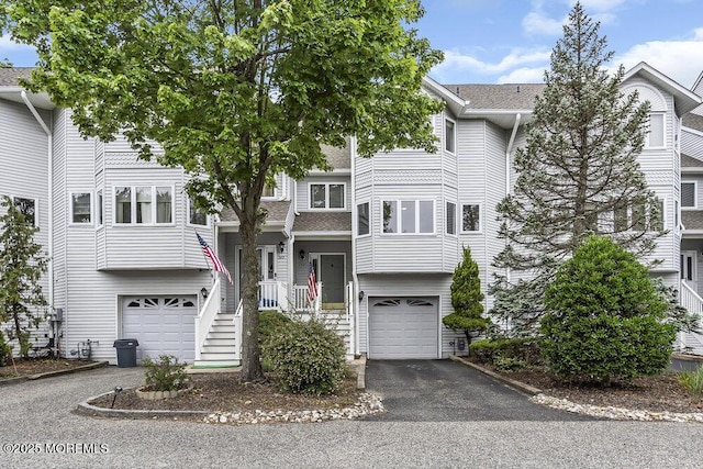 203 Muskflower Ct, Toms River, NJ 08753 - view of front of house featuring a garage, driveway, and a shingled roof