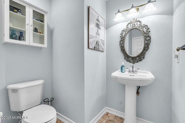 203 Muskflower Ct, Toms River, NJ 08753 - bathroom with toilet and baseboards