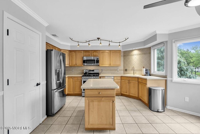 203 Muskflower Ct, Toms River, NJ 08753 - kitchen featuring stainless steel appliances, light countertops, decorative backsplash, a center island, and light tile patterned floors