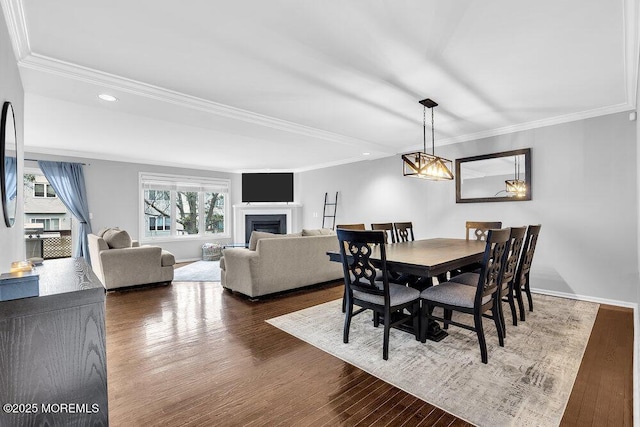 203 Muskflower Ct, Toms River, NJ 08753 - dining room with wood finished floors, recessed lighting, crown molding, and a fireplace