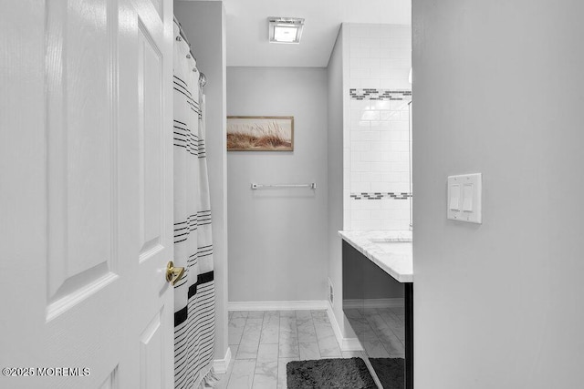 203 Muskflower Ct, Toms River, NJ 08753 - bathroom featuring marble look tiles and vanity