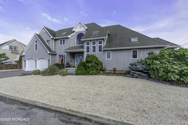 1030 Montauk Dr, Forked River, NJ 08731 - view of front of home with a shingled roof and driveway